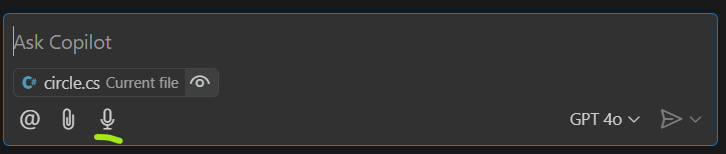 GitHub Copilot voice chat. Click to speak into GitHub Copilot and it will translate your voice to text.